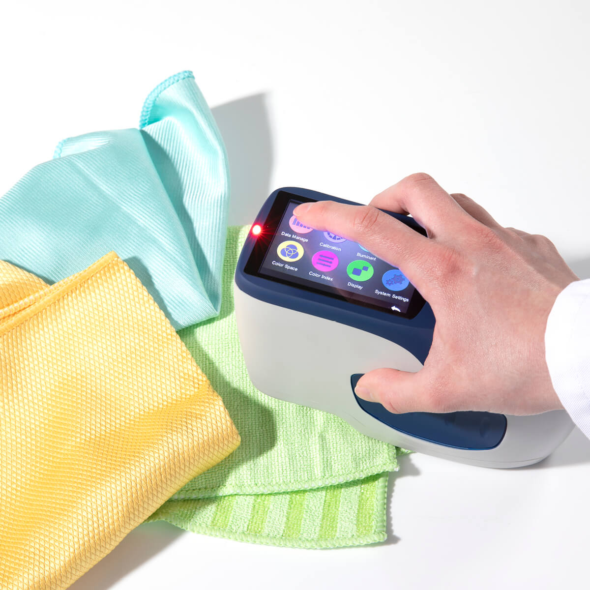 a hand touching a device